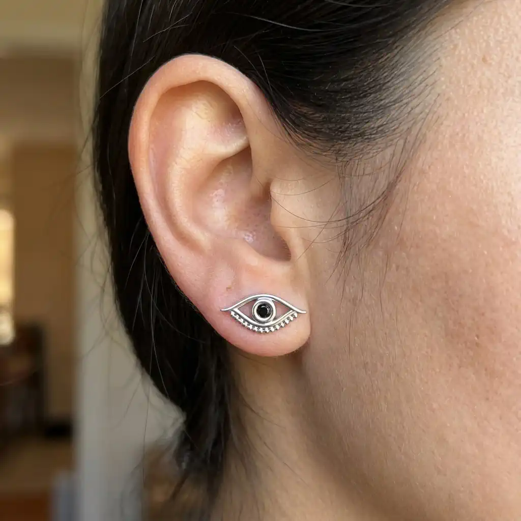 0.05 carat round black diamond evil eye solitaire stud earrings in sterling silver