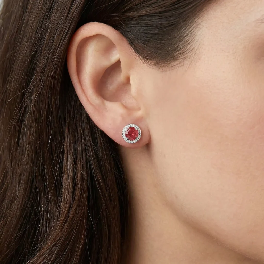 woman wearing 5mm round pink tourmaline solitaire stud earrings
