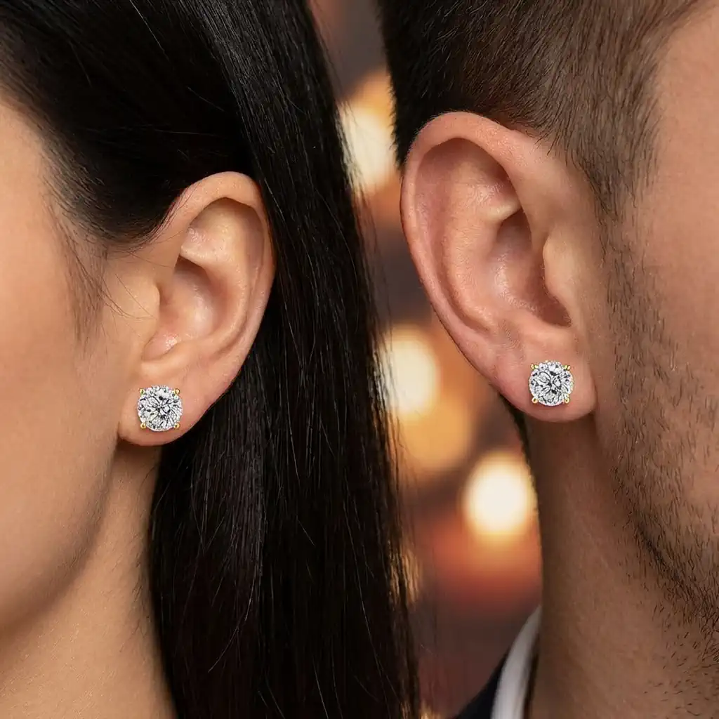 Man and woman wearing flat back round moissanite stud earrings in gold plated sterling silver