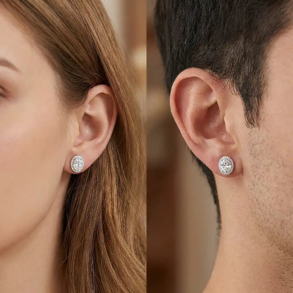 Man and woman wearing oval halo moissanite stud earrings in white gold plated sterling silver